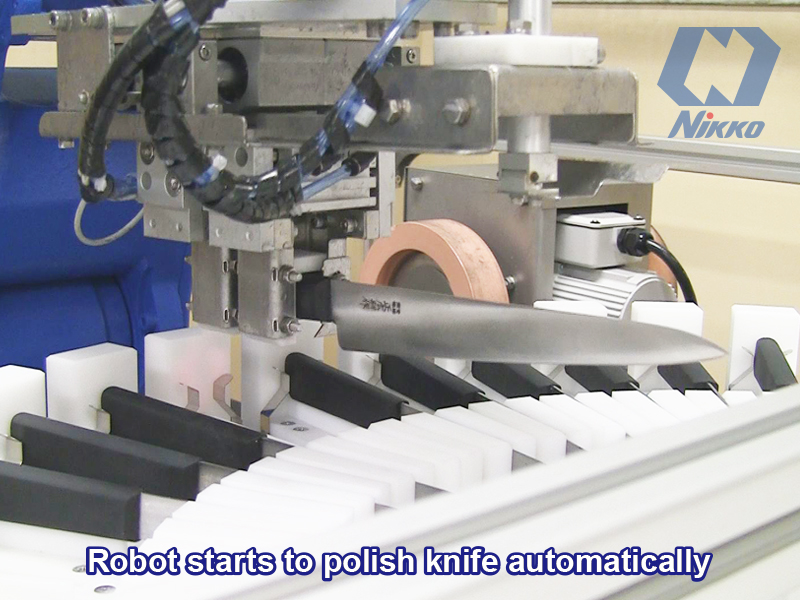 Robot starts to polish knife automatically